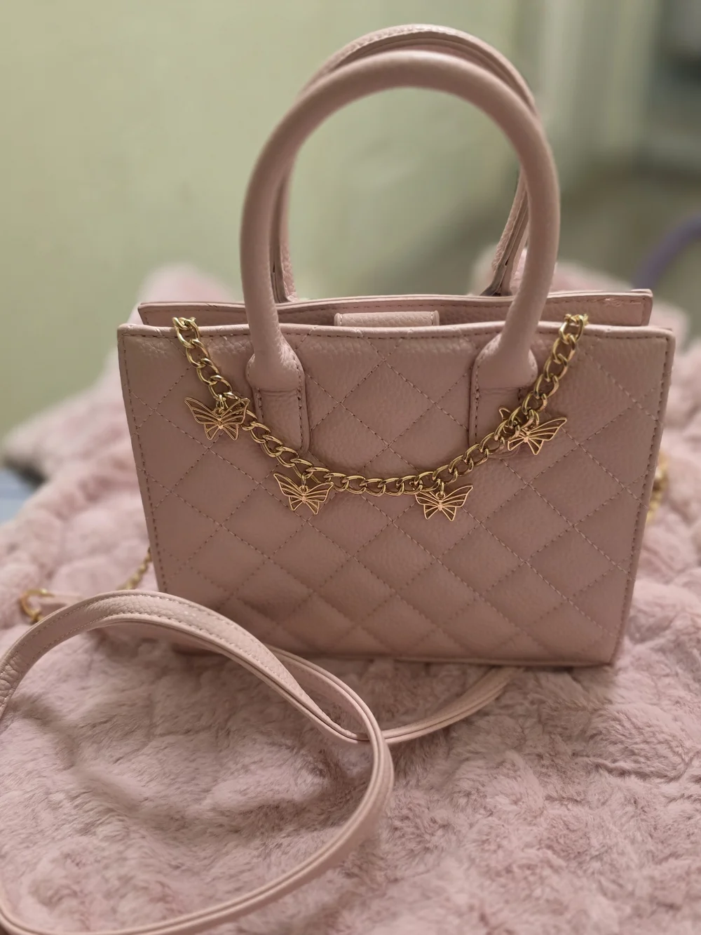 Quilted Pink Top-Handle Satchel with Gold Butterfly Chain